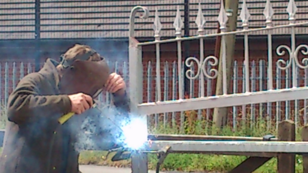 Adrian welding an ornimental domestic gate and railings